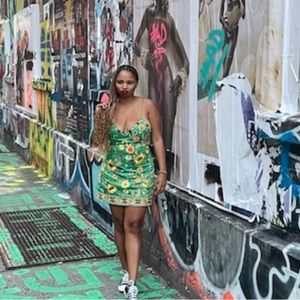 ALICE AND OLIVIA!
Colorful floral embroidery notch up this chic slip dress.